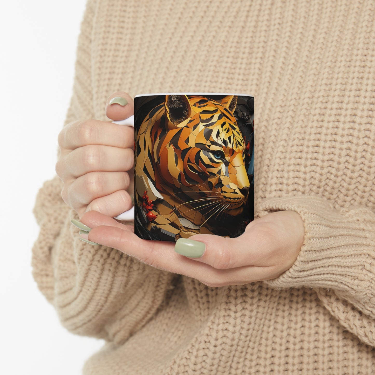 White ceramic mug showing the wraparound tiger and panther design with red berry accents and dark leaf forms.