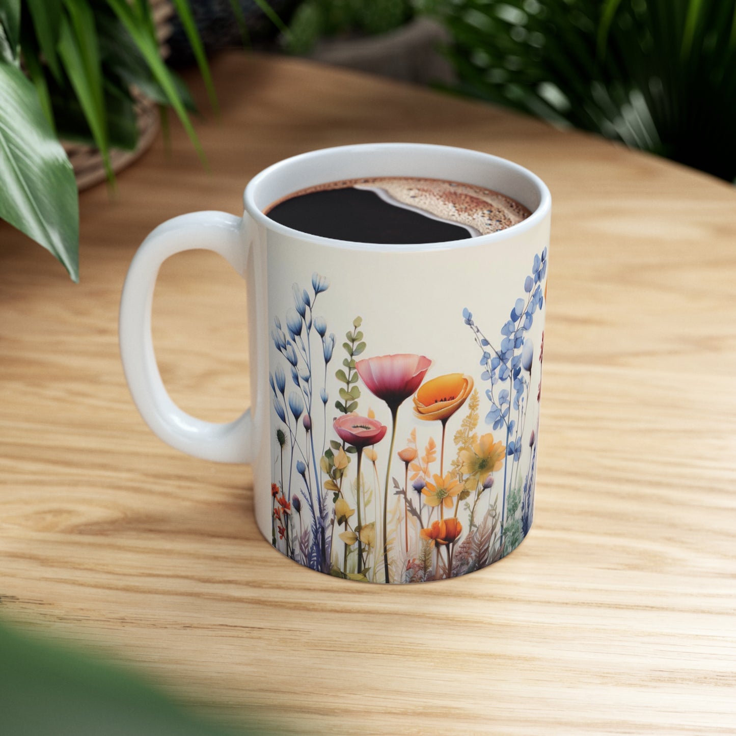 Floral watercolour mug on table, 11oz ceramic mug with vibrant floral design and rounded edges for a cozy feel