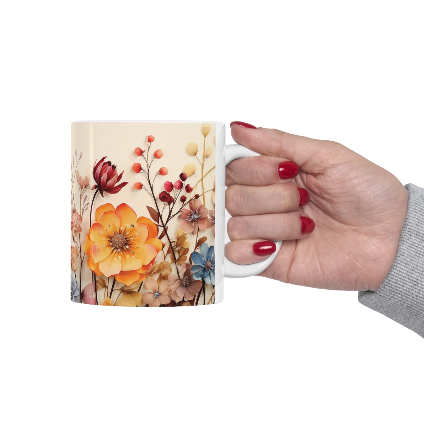 Model holding floral watercolour mug, 11oz ceramic mug with colourful floral design and ergonomic C-handle for effortless use