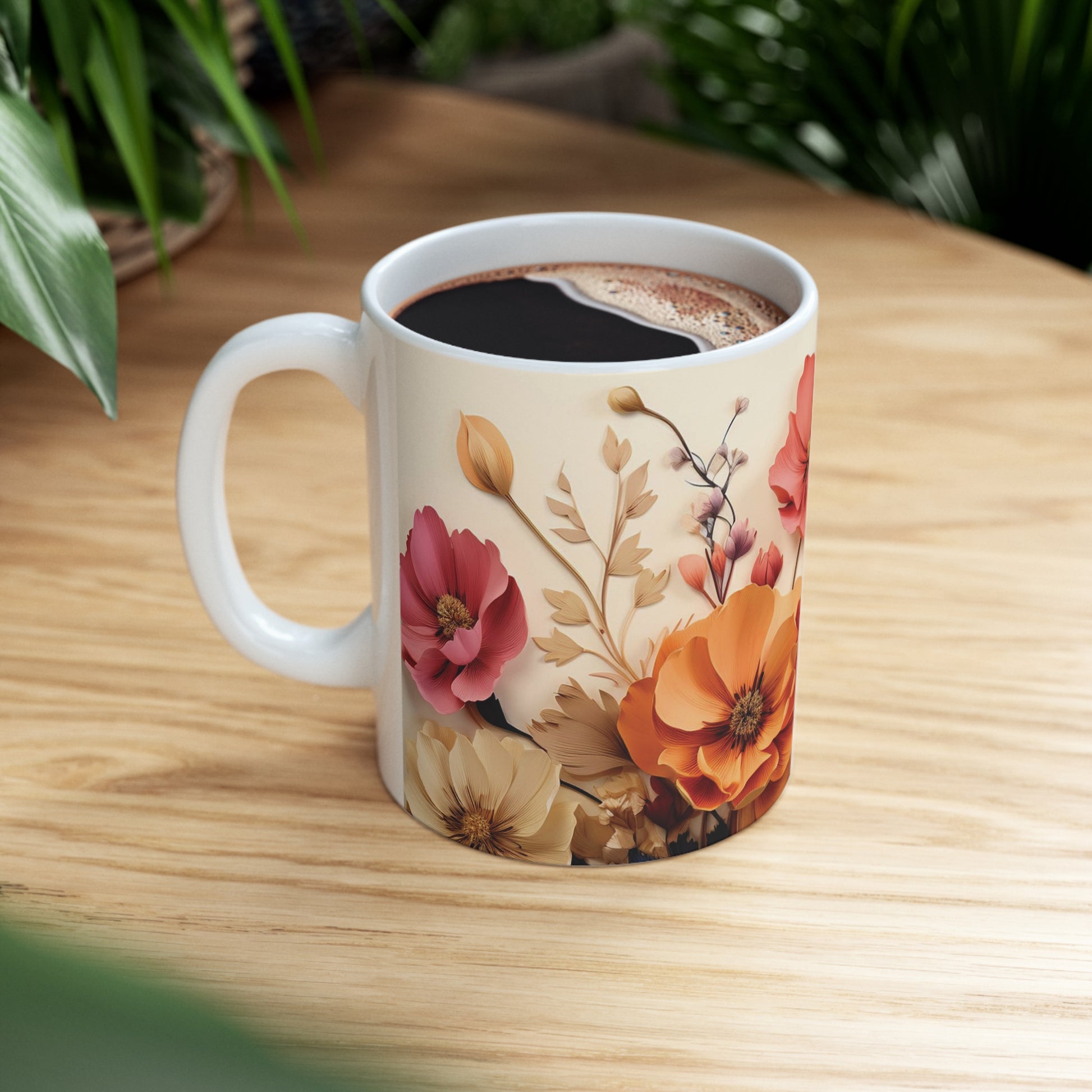 Floral watercolour mug resting on table, 11oz ceramic mug with bright, floral patterns and rounded corners for a cozy vibe