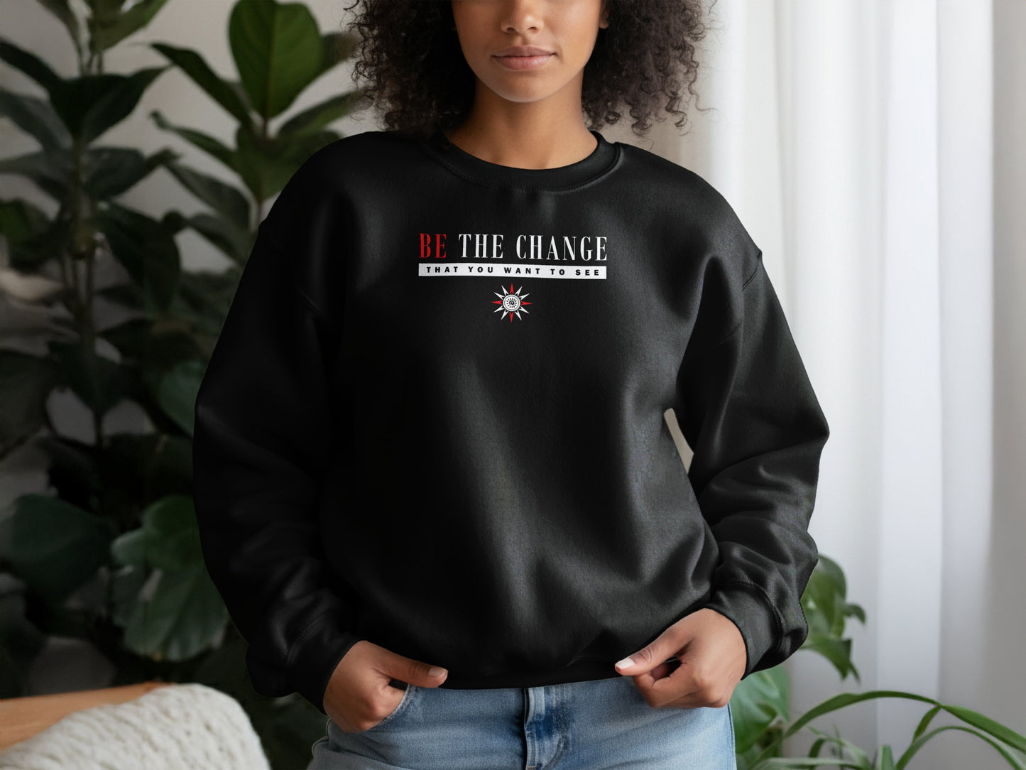 Black Be the Change sweatshirt with inspirational quote, ribbed cuffs, and cozy soft cotton blend.