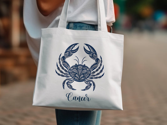 Cancer zodiac-themed tote bag in soft cotton with long straps and celestial detailing.