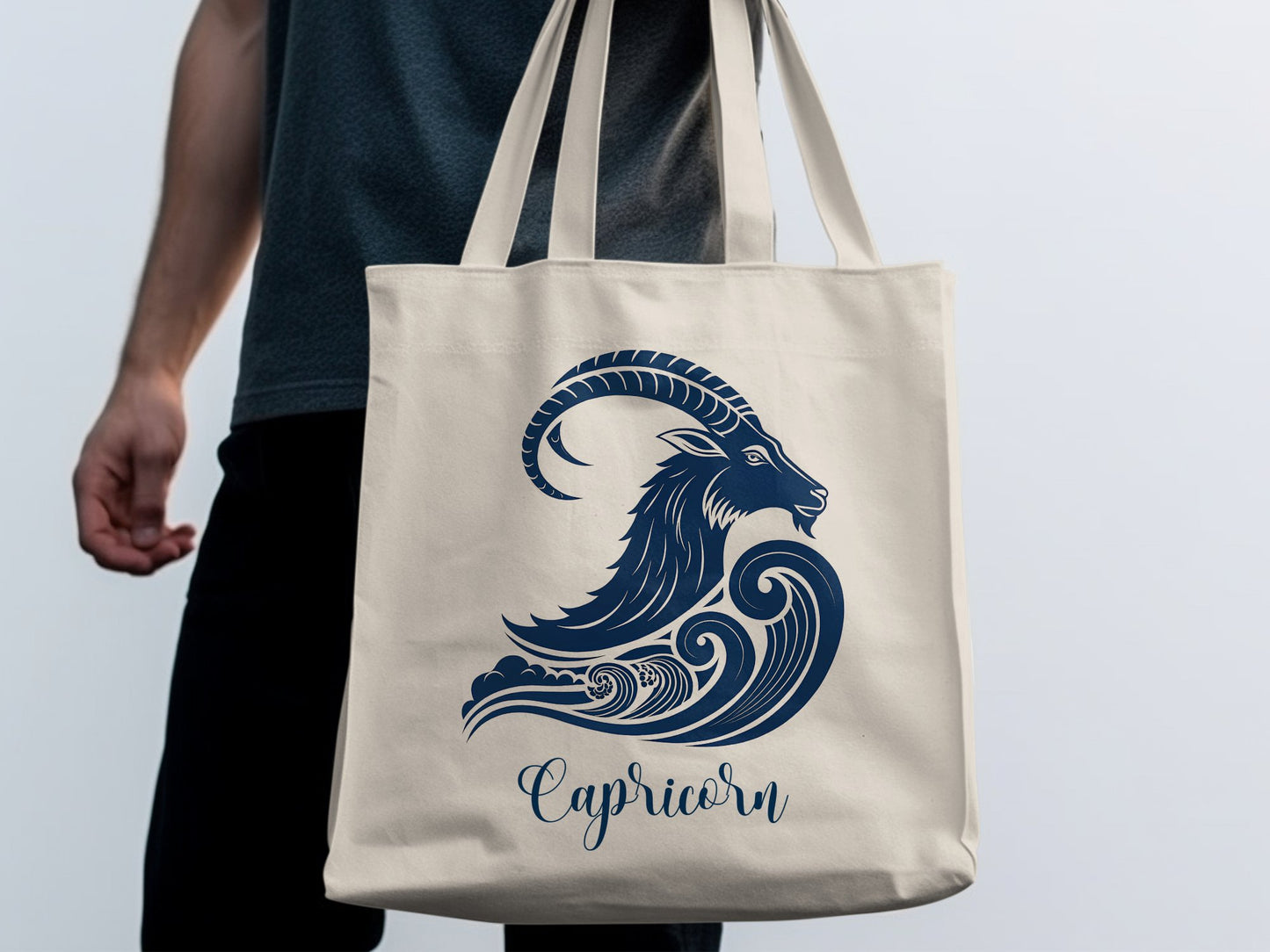 Model with neutral Capricorn tote, long handles and soft cotton feel for everyday use.