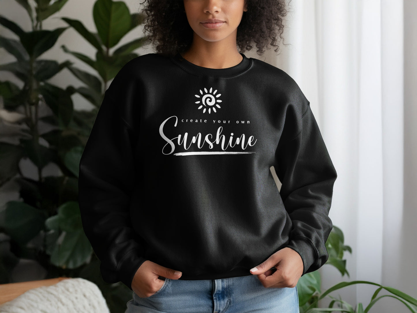 Black Create Your Own Sunshine sweatshirt with bold white typography, unisex cotton blend for everyday motivational wear.