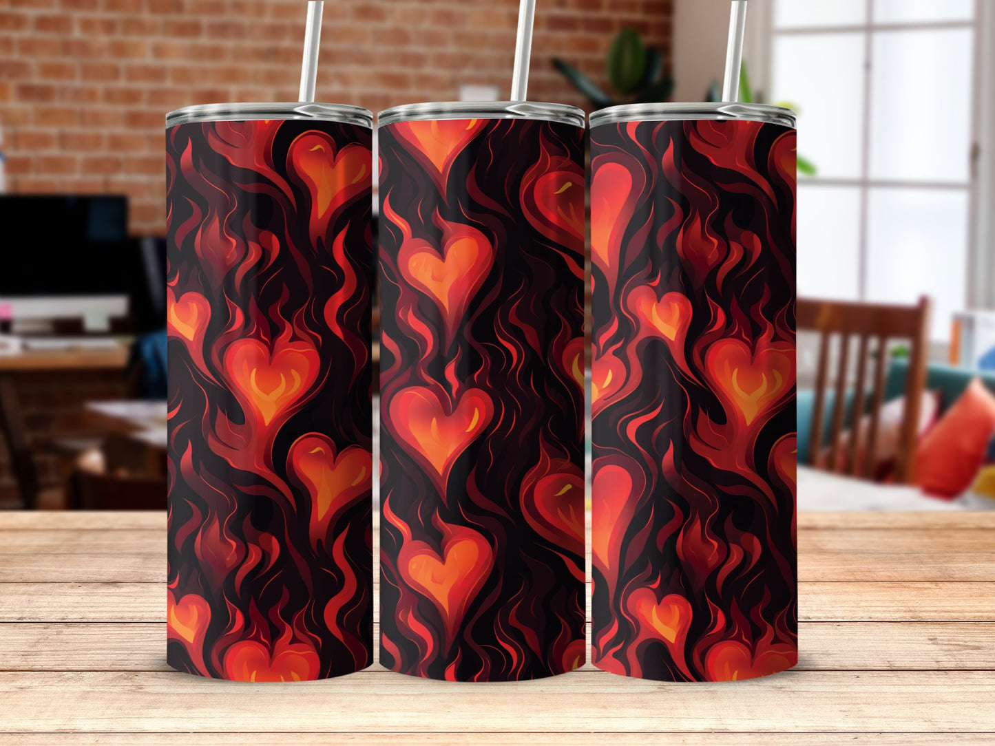 Flaming hearts tumbler on table, 20oz stainless steel with eye-catching heart design and durable construction