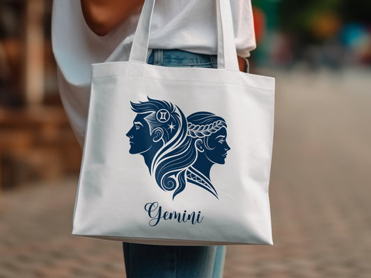 Gemini zodiac tote bag modelled in white version, bold astrological twin symbol on premium cotton.