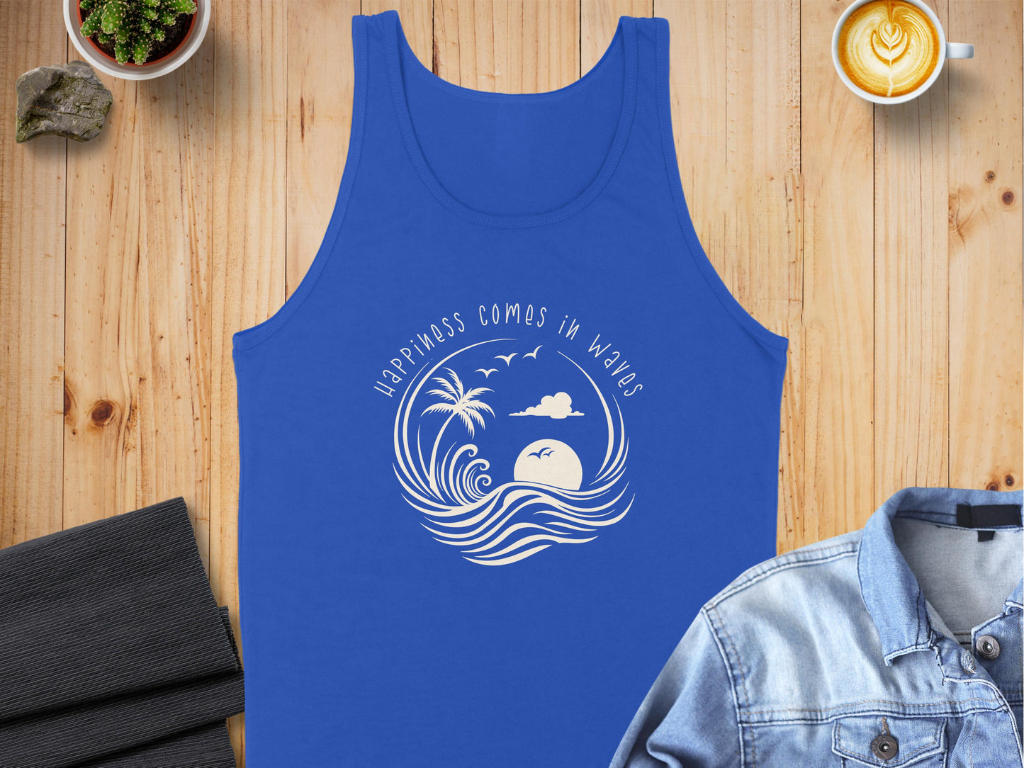 True Royal Blue Happiness Comes in Waves Tank Top, sleeveless, scoop neck, soft fabric, and a feel-good graphic design.