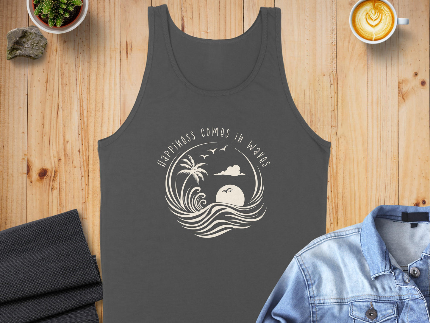 Charcoal Happiness Comes in Waves Tank Top, sleeveless with scoop neck, unisex fit, and a calming wave graphic.