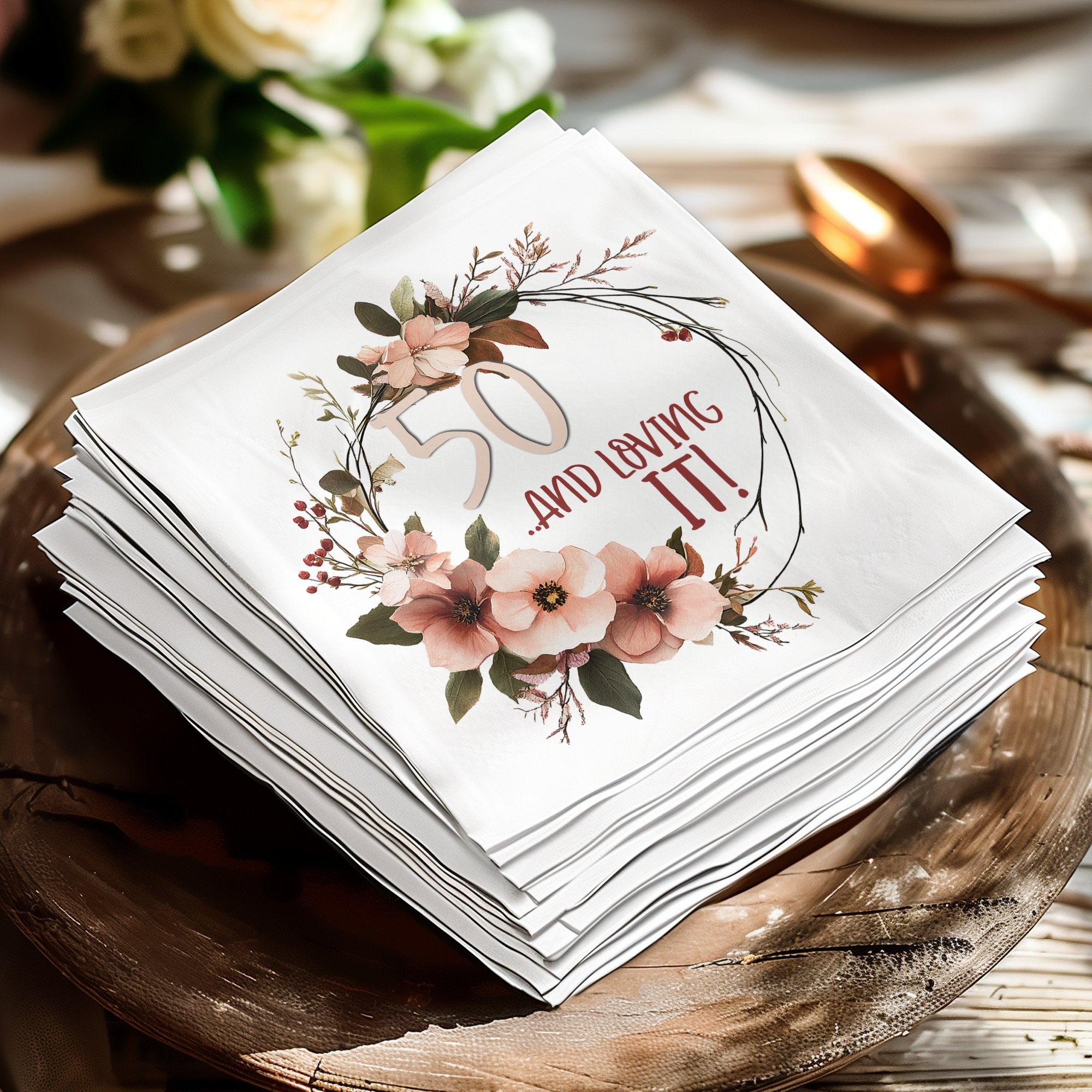 Birthday napkins FAQ covering suitability for kids and adults, absorbency, milestone designs, and bulk orders.