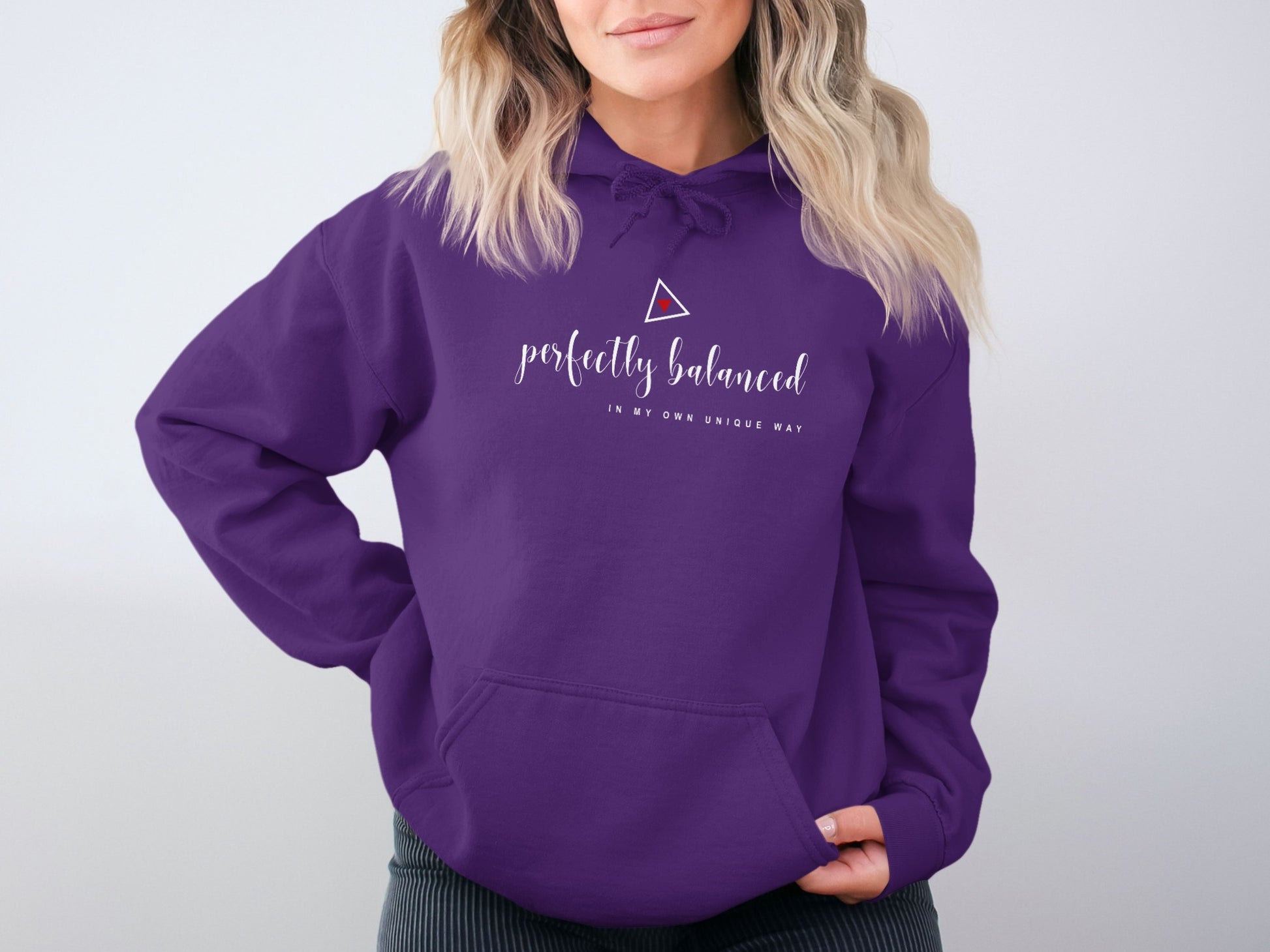 Perfectly Balanced hoodie in purple with spiritual graphic, fleece lining, unisex fit, and cozy kangaroo pocket front.