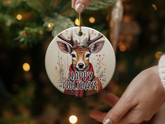 Ceramic Happy Holidays ornament with a reindeer and festive details, perfect for Christmas trees