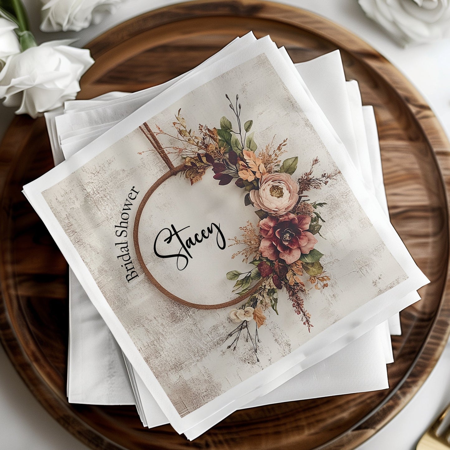 Napkins featuring a rustic wreath design, ideal for a relaxed, country-inspired bridal shower.