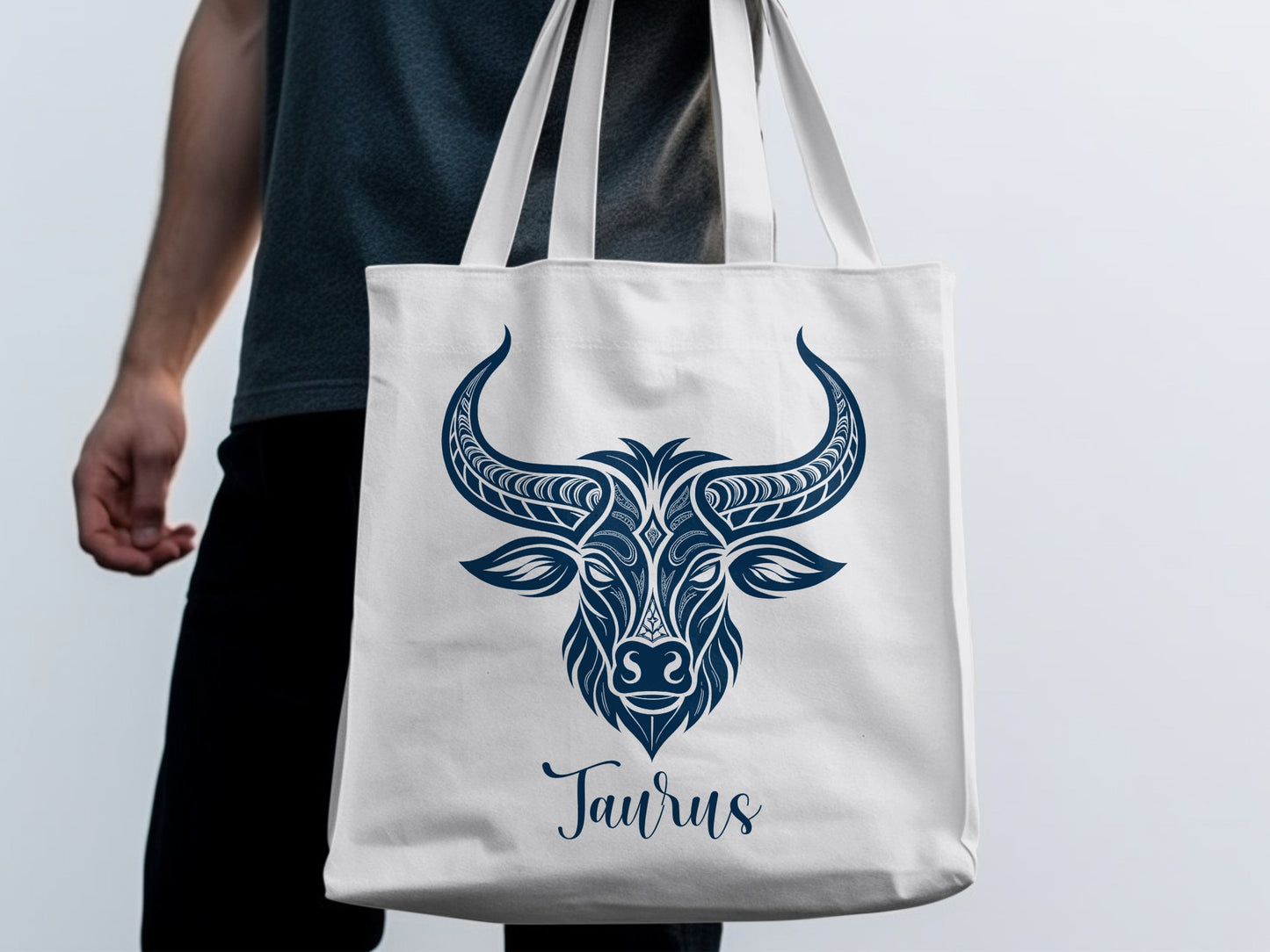 Taurus Tote Bag with detailed bull's head artwork combining decorative scroll patterns and symmetrical composition.