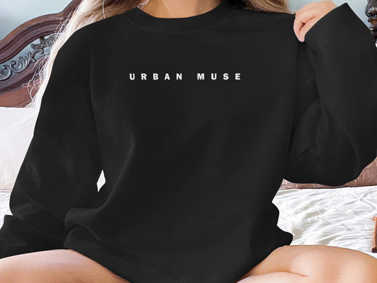 Black Urban Muse Sweatshirt with graphic design, crew neck, seamless body, and soft cotton blend for relaxed style.