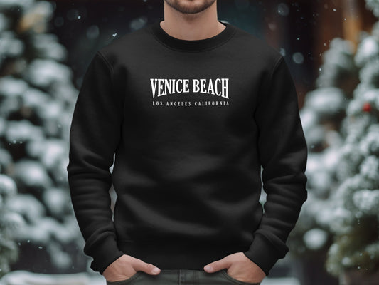 Black Venice Beach Sweatshirt, soft cotton blend, crew neck, seamless body, and relaxed unisex fit for ultimate comfort.