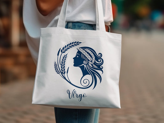 Virgo zodiac cotton tote worn by model, 15x16 inch size with blue-tone celestial print
