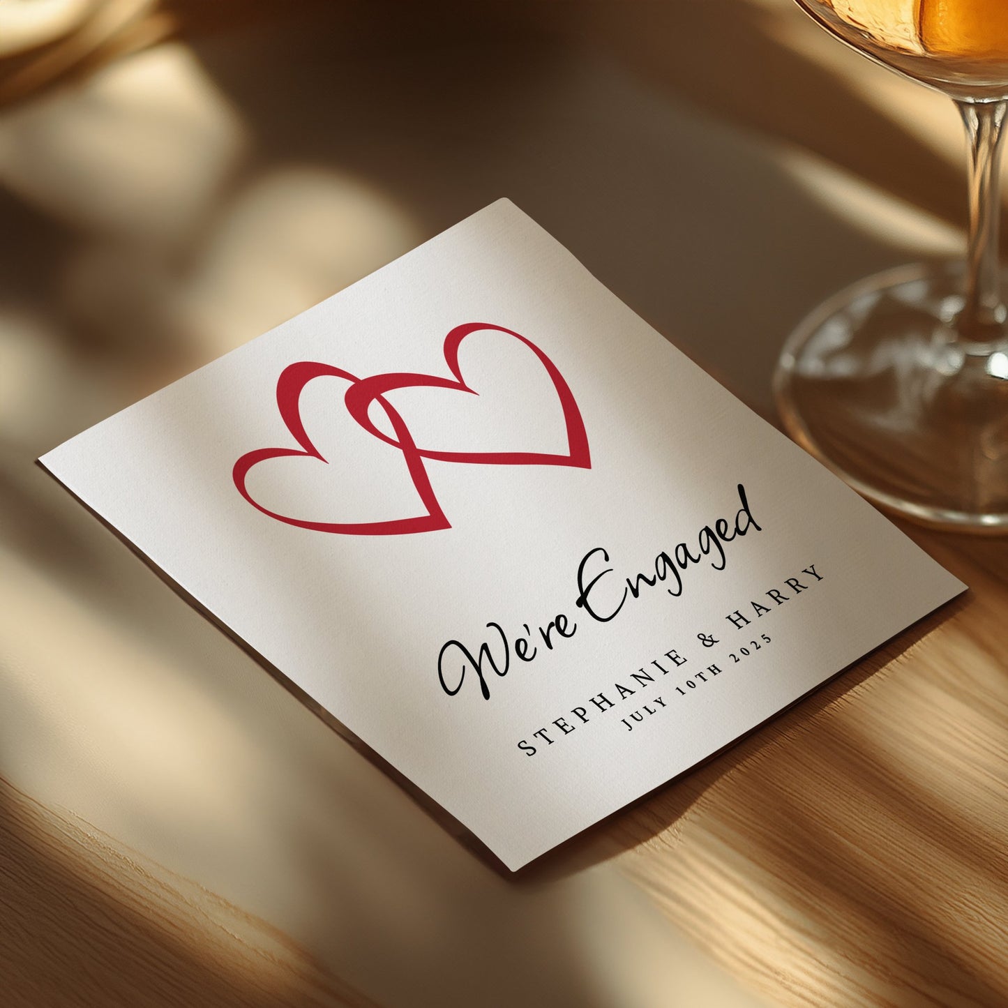 Celebrate your engagement with custom napkins featuring a personal touch, perfect for drinks and festive occasions.