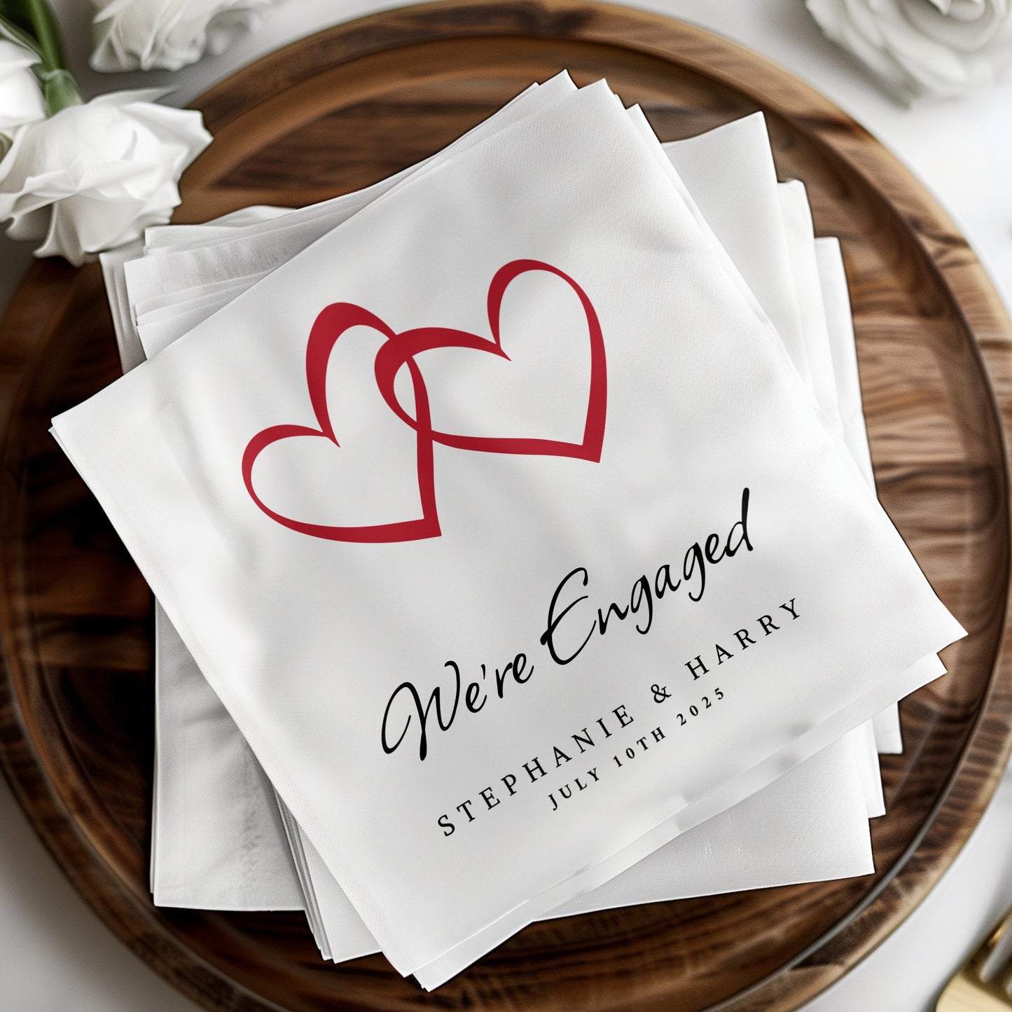 Custom We're Engaged napkins, perfect for your engagement party or event, enhancing your drinks and meal presentation.