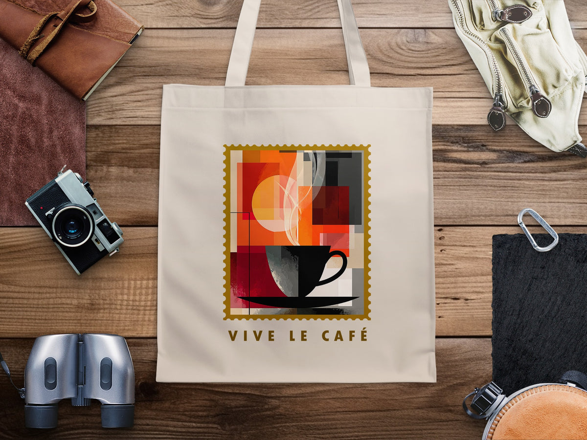 Abstract Coffee Blocks canvas tote bag with black cup and saucer, layered colour blocks, golden circle and gold serrated stamp border.