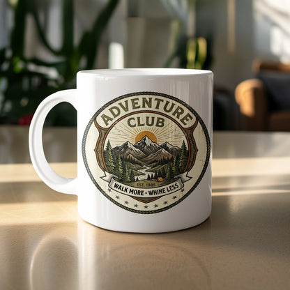 11oz Adventure Club ceramic mug featuring a mountain landscape, camping tent emblem, and Walk More Whine Less motto.