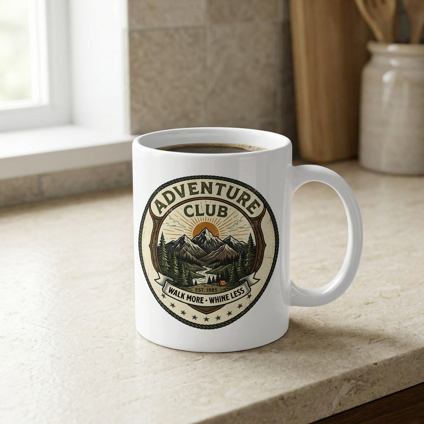 Detailed view of the 11oz glossy ceramic mug showing the olive green, amber, and rope-bordered hiking club patch.