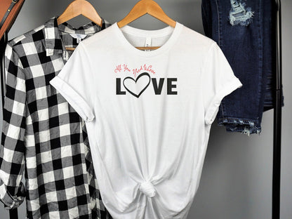 All You Need Is Love shirt in white – hanging display of soft cotton crew neck tee with short sleeves