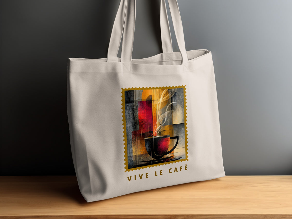 Amber Steam Tote Bag on timber sideboard with charcoal cup, cream steam and VIVE LE CAFE golden subtitle.