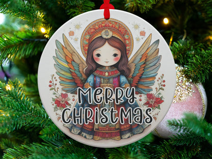 Festive tree ornament featuring detailed angel illustration, floral accents, and colourful folk-art styling.