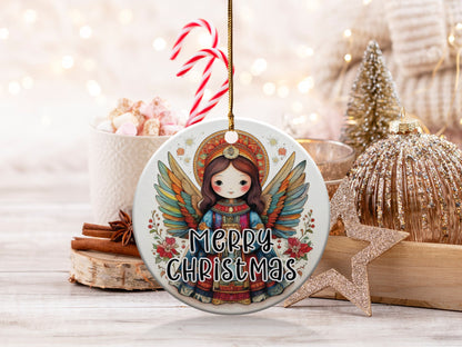 Angel Christmas ceramic ornament featuring a smiling angel girl with colourful wings, poinsettias, and mandala halo.