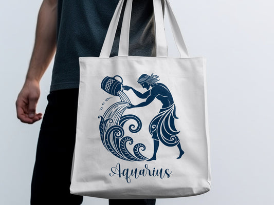 Aquarius Tote Bag displaying an ornate water-bearer graphic with elegant Aquarius script lettering beneath.