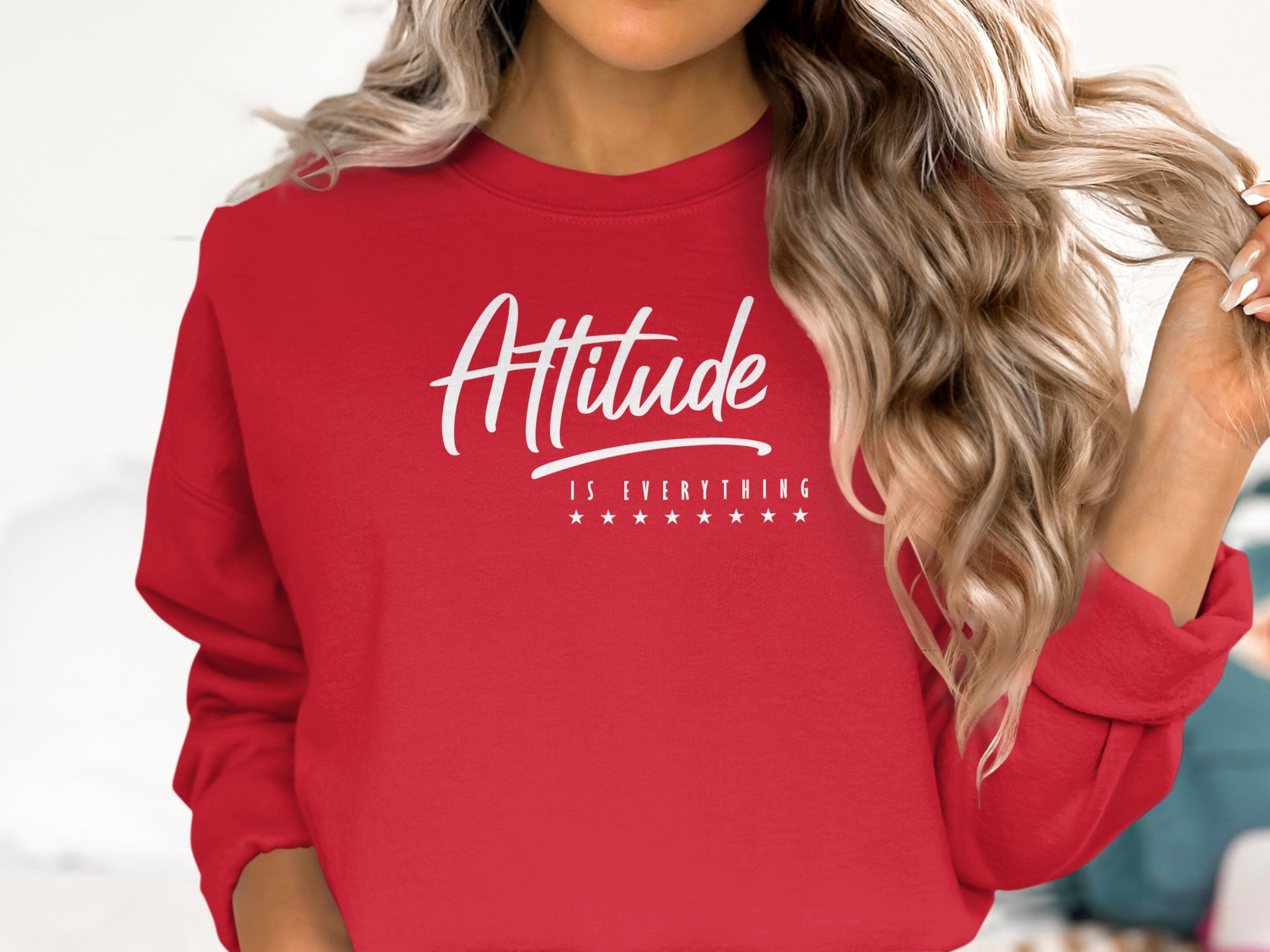 Vibrant red Attitude is Everything pullover sweater featuring inspirational message and comfortable everyday unisex fit.