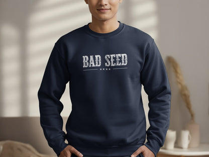 Navy Bad Seed graphic sweatshirt with large distressed white BAD SEED serif lettering and an aged, weathered print texture.