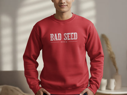 Red Bad Seed Sweatshirt highlighting the white distressed typography, fine divider line and four small stars in a vintage emblem layout.