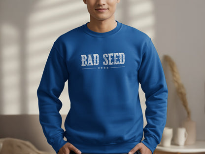 Royal Blue Bad Seed Sweatshirt displaying the full distressed BAD SEED chest graphic, with structured serif lettering and four stars below.