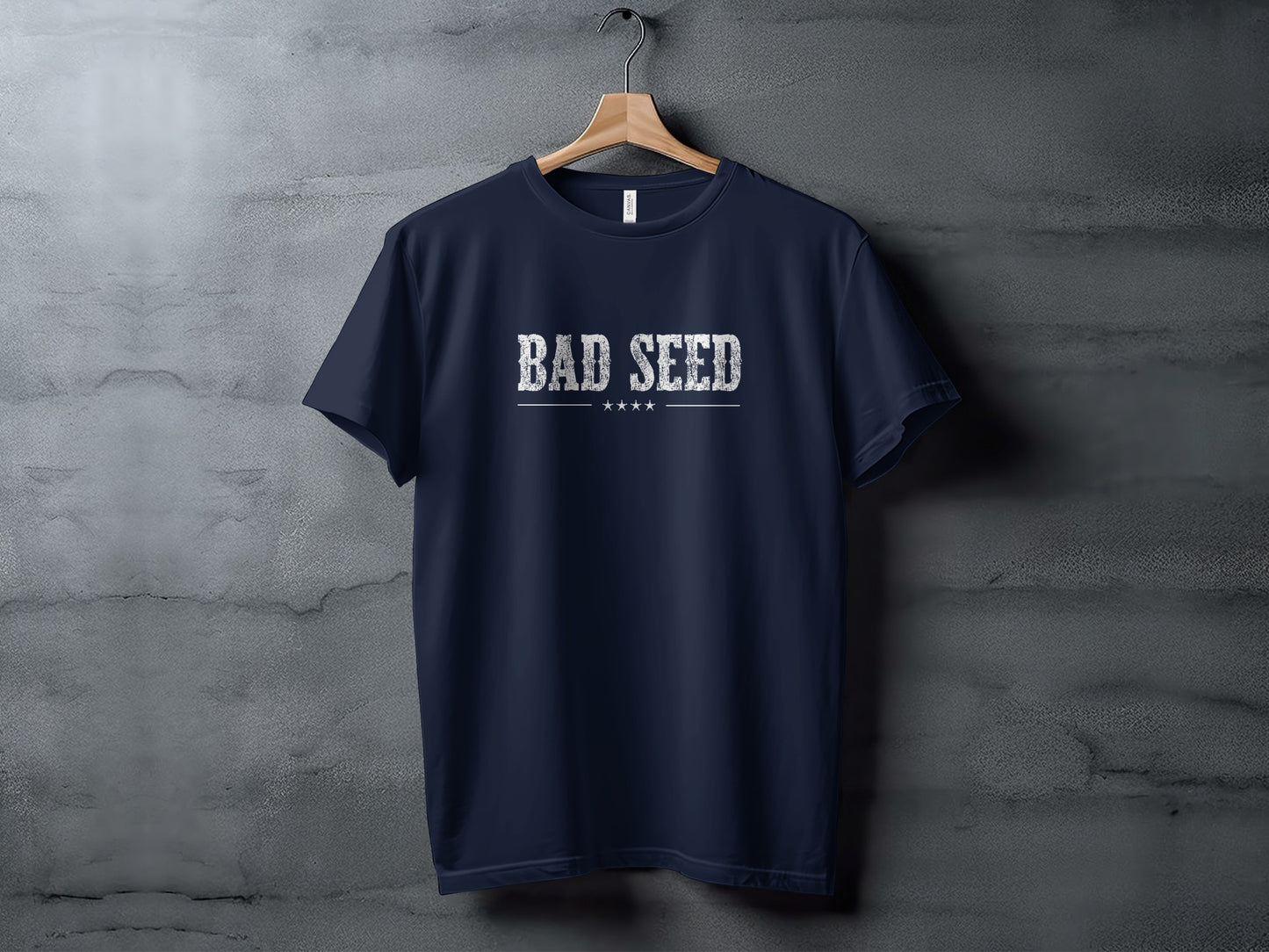 Navy Bad Seed T-Shirt with worn vintage-print typography, white lettering and subtle star details across the chest.