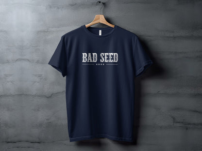 Navy Bad Seed T-Shirt with worn vintage-print typography, white lettering and subtle star details across the chest.