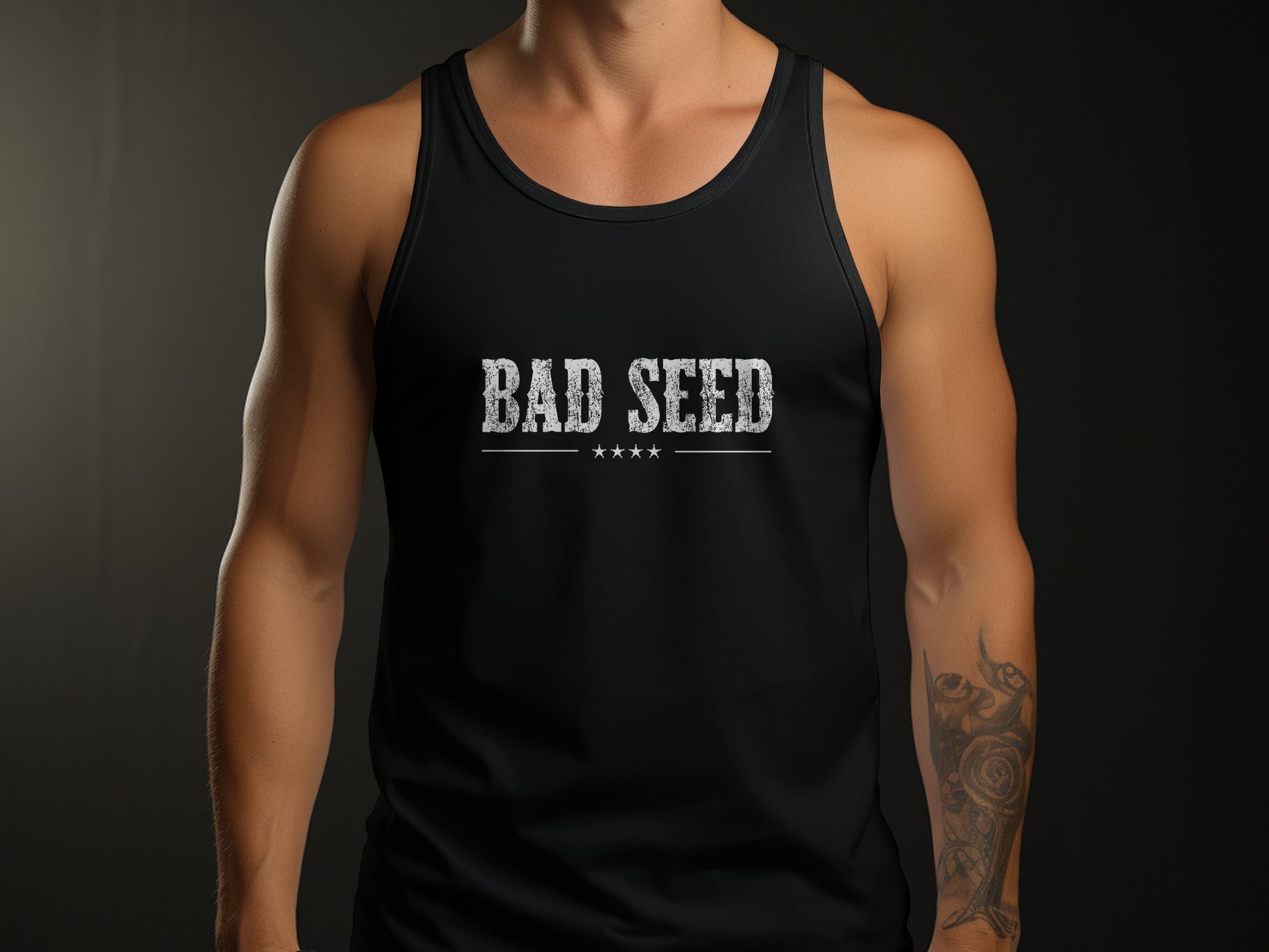 Black Bad Seed Tank Top featuring bold distressed white 'BAD SEED' lettering and four small stars beneath.