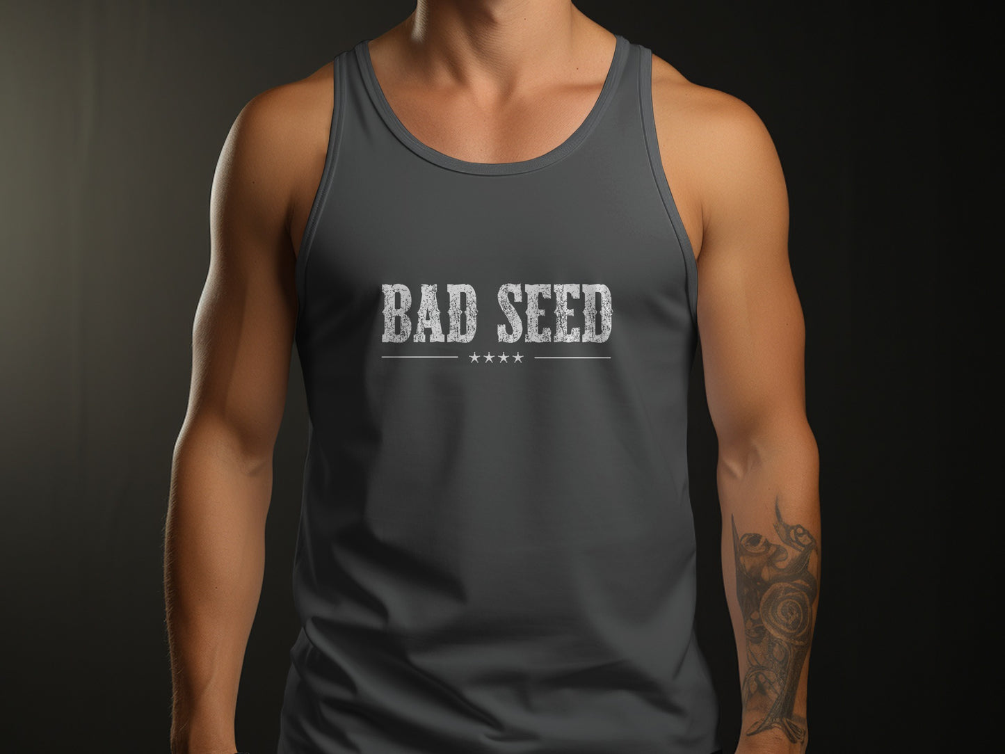 Charcoal-Black Triblend Bad Seed Tank Top with distressed white typography and a vintage-inspired star motif across the chest.