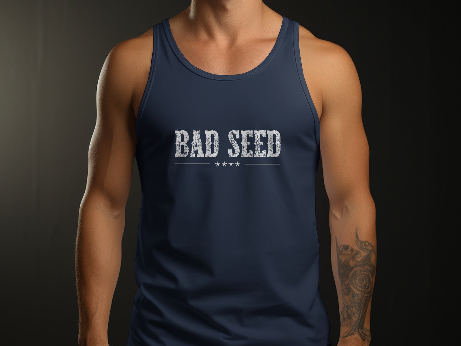 Navy Bad Seed Tank Top featuring distressed white serif lettering, four stars and a vintage-inspired chest graphic.