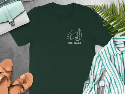 Forest green Beach Culture t-shirt featuring a minimalist surf chest graphic with a wave, sun, and birds in a clean white outline.