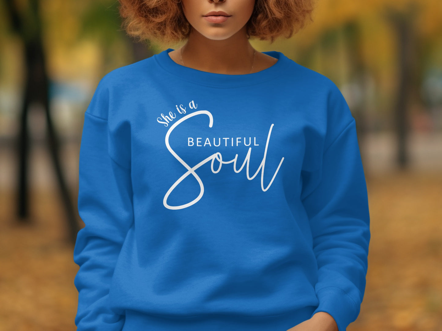 Royal blue women’s sweatshirt with She is a Beautiful Soul uplifting message, cozy long sleeve fashion top, unisex sizing.