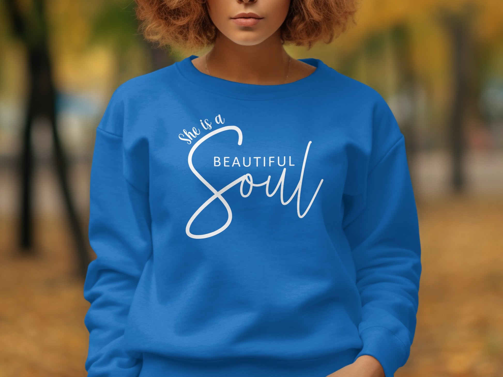 Royal blue women’s sweatshirt with She is a Beautiful Soul uplifting message, cozy long sleeve fashion top, unisex sizing.