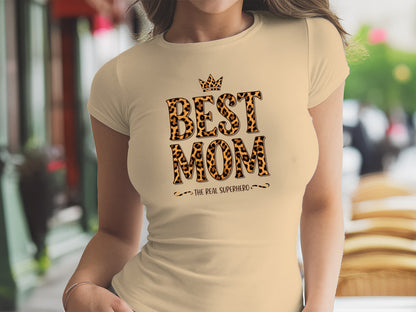 Best Mom The Real Superhero T-Shirt in warm cream, lightweight Airlume cotton with modern crew neck style.
