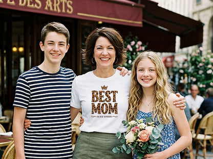 Mom wearing Best Mom The Real Superhero T-Shirt celebrating Mother’s Day with kids, smiling and joyful.