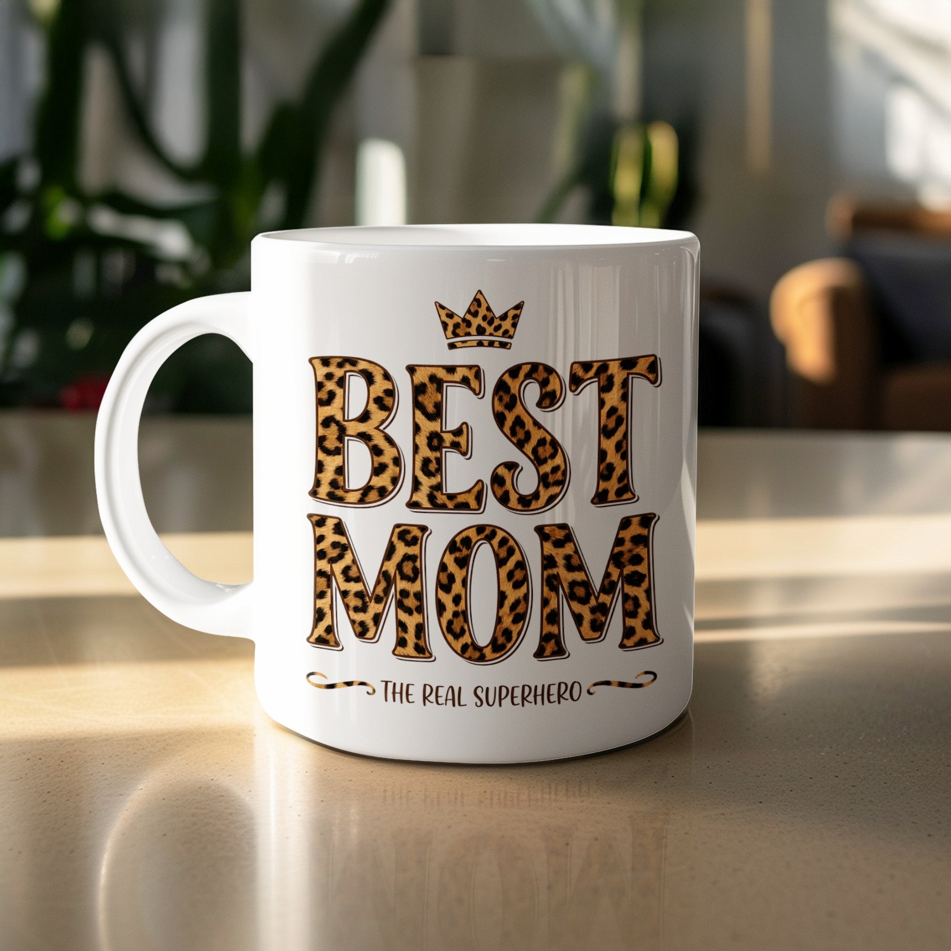 Best Mom The Real Superhero 11oz mug with leopard print on table, bold ceramic gift for stylish coffee moments.