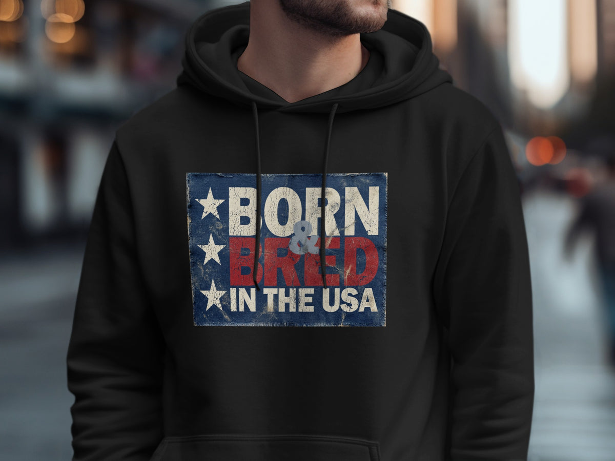 Black Born & Bred in the USA Hoodie featuring bold red and off-white lettering, three white stars and distressed navy artwork.