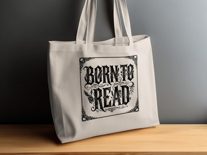 Born to Read Tote Bag on timber sideboard with roses, vine tendrils, skull motifs and intricate ornamental scrollwork.