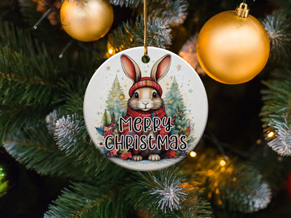 Ceramic Christmas ornament showcasing a winter bunny portrait with festive woodland holiday decorations.