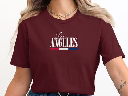 Maroon California Pride LA T-Shirt featuring modern LA script typography in clean centred chest layout with understated colour accent.