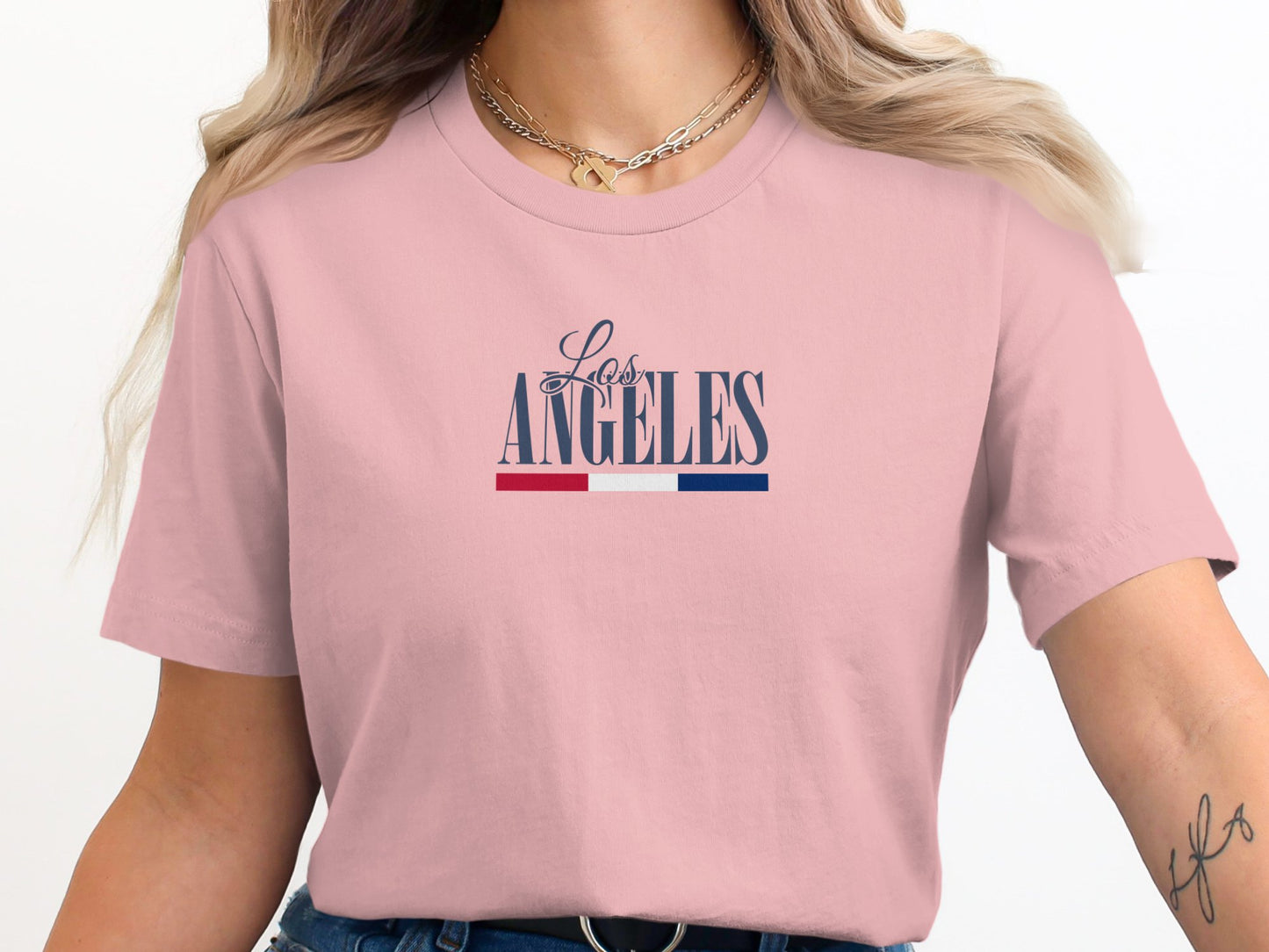 Pink California Pride Los Angeles T-Shirt with relaxed script typography and bold LA lettering in a clean centred composition.